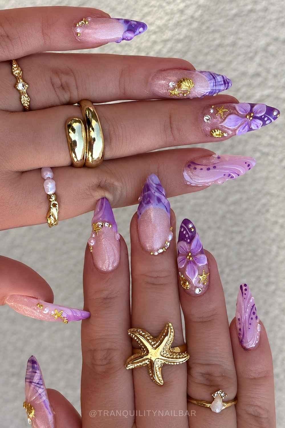 Purple nails with 3d elements and gold accents