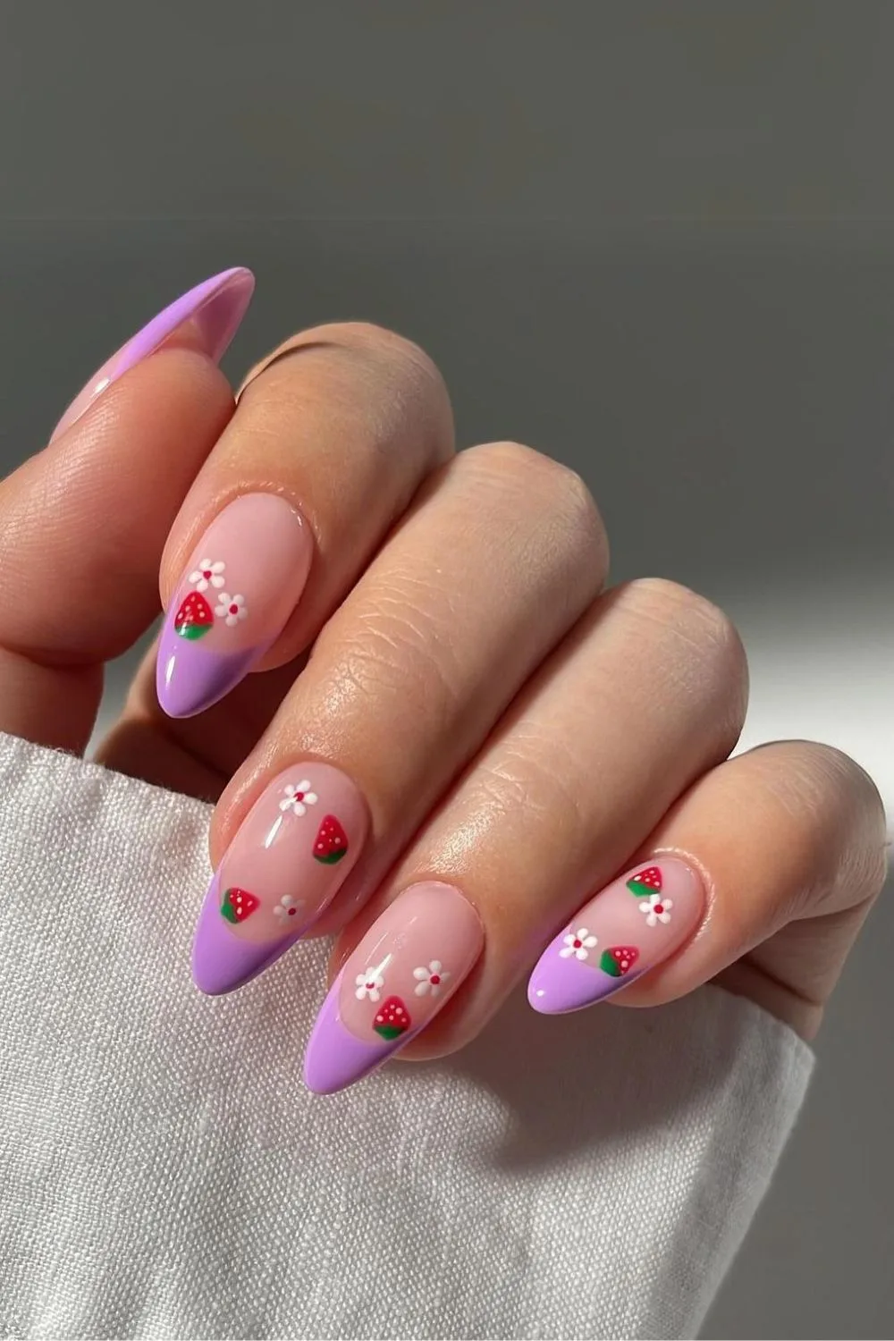 Purple nails with strawberries