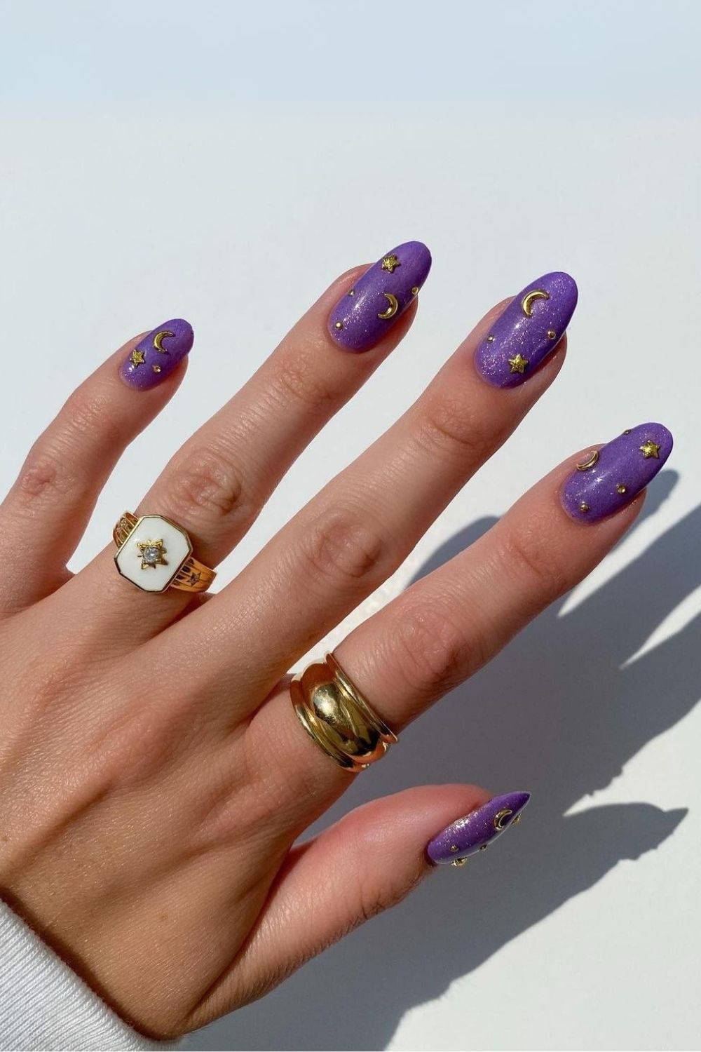 Purple velvet nails with gold charms