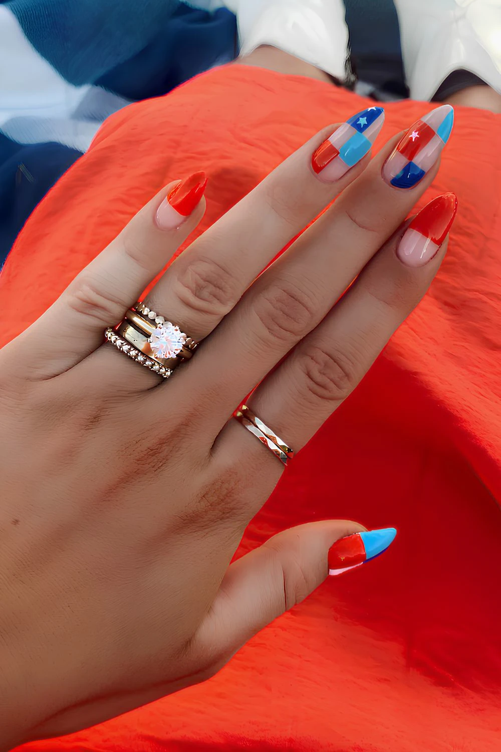 Red and blue checkerboard nails with stars