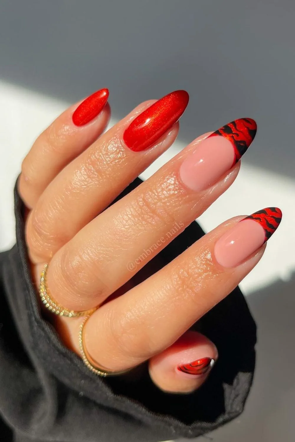 Red animal print nails