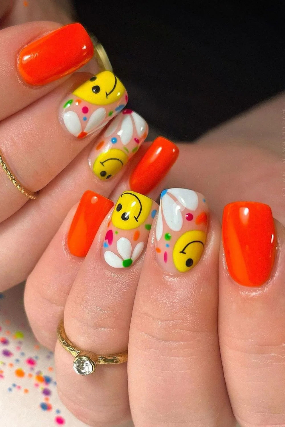 Red smiley face nails