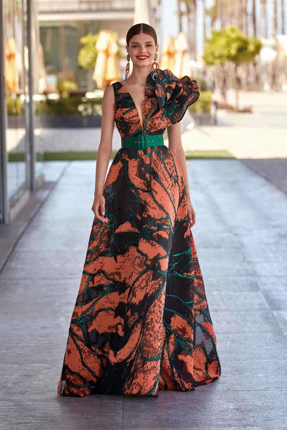 Ruffled print gown with a belt