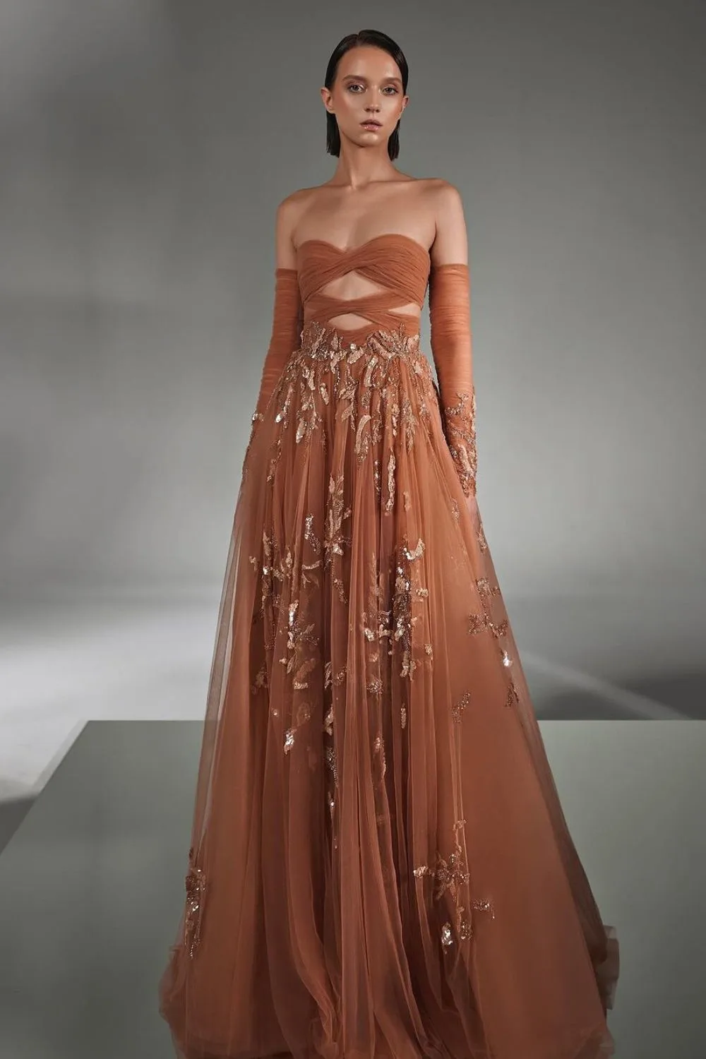 Rust tulle cut-out gown