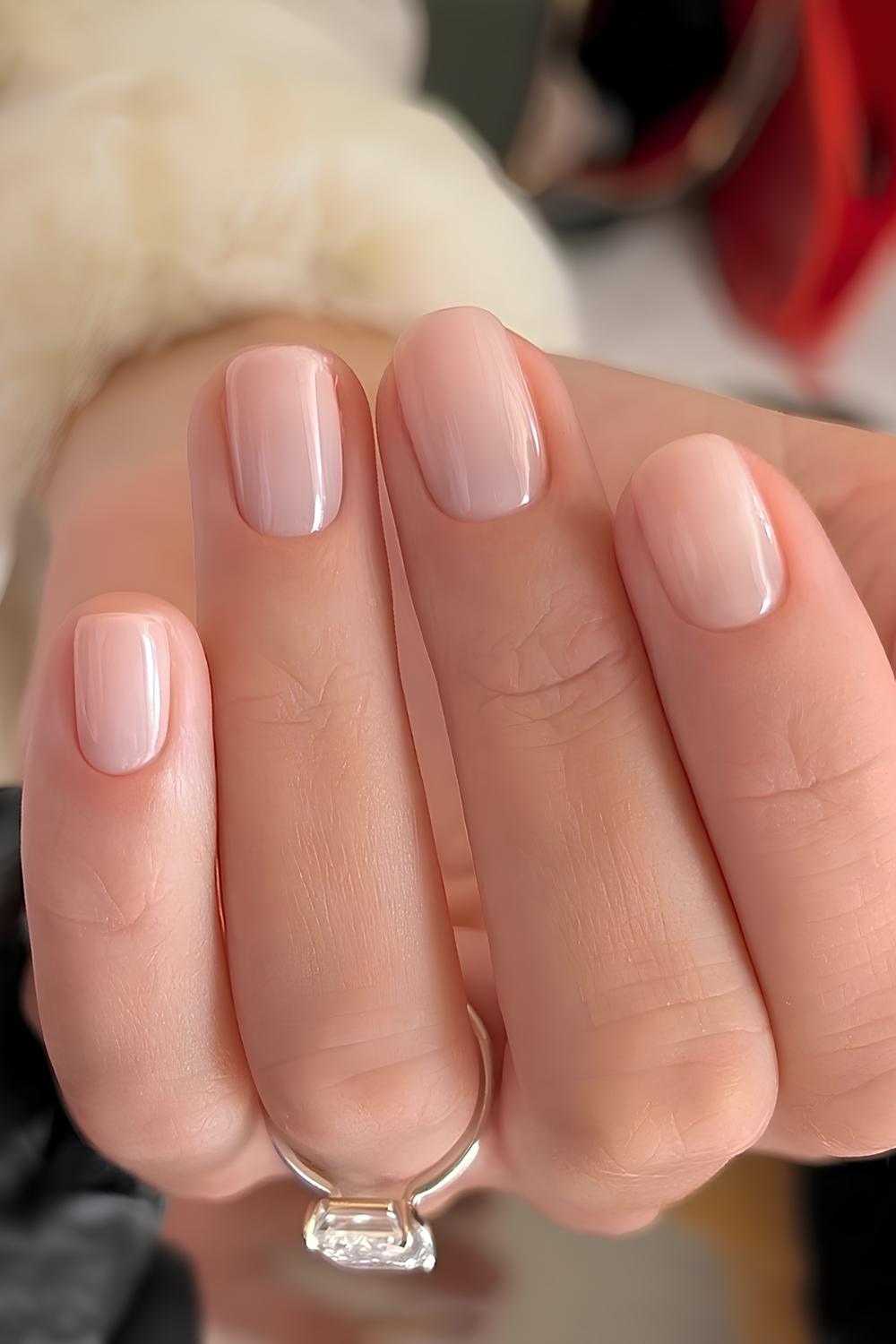Short glossy neutral nails