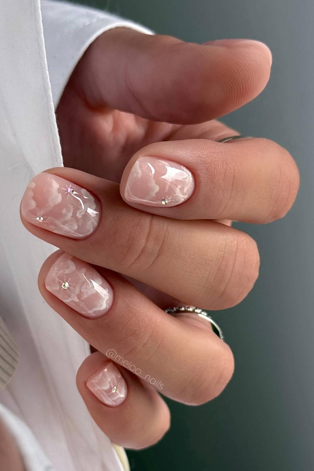 Short sheer nails with cloud and celestial art