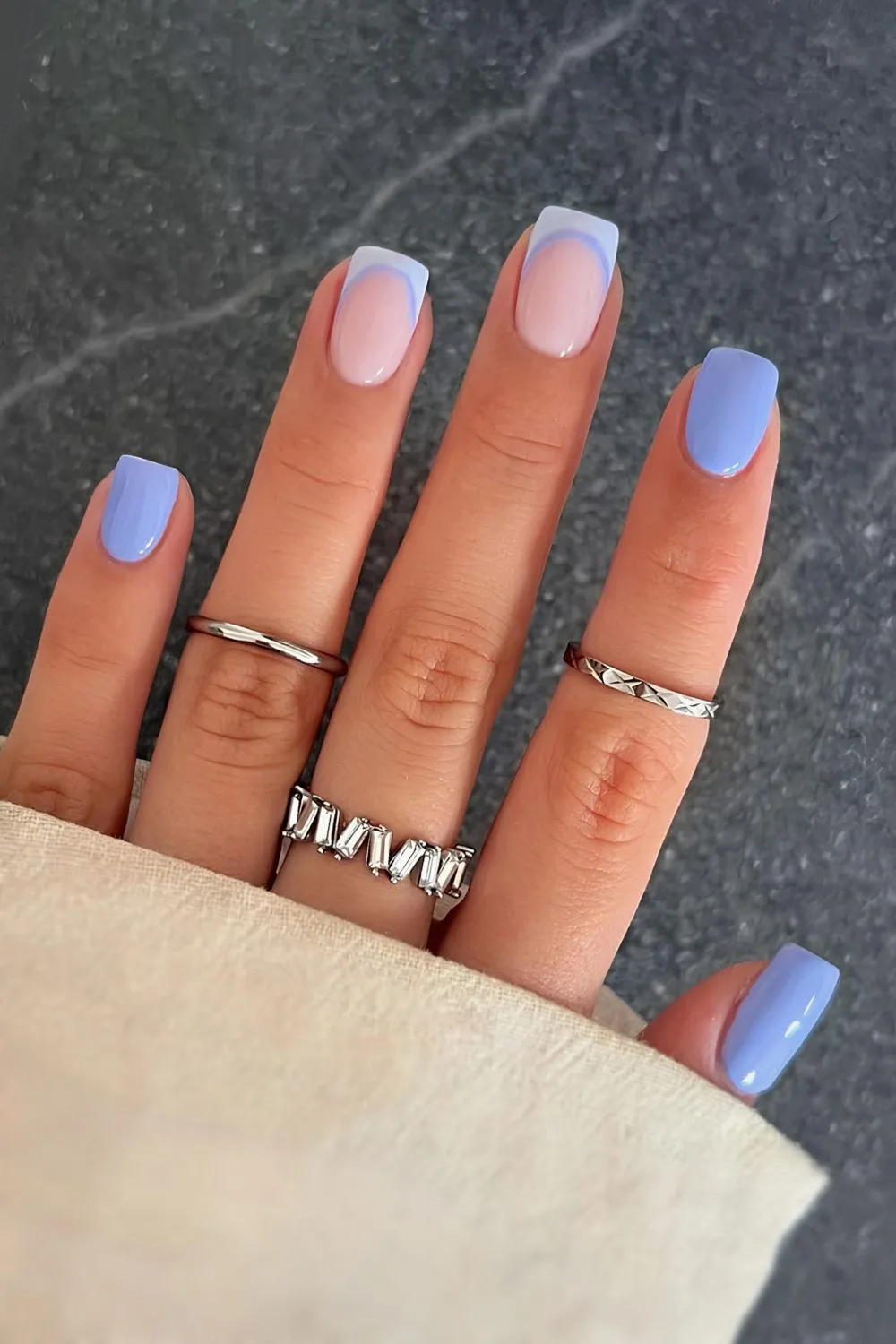 Sky blue nails with accent French tips