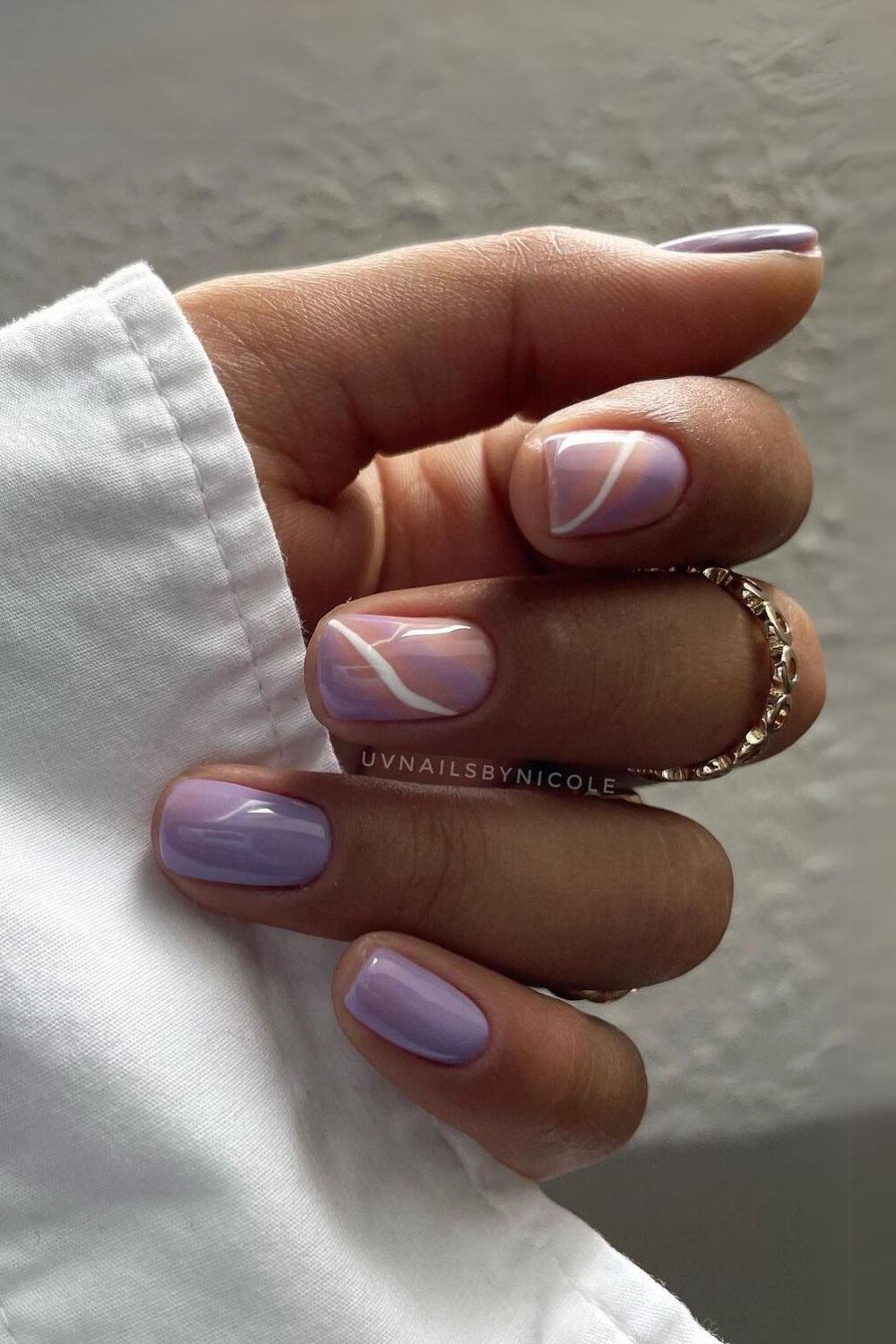 Soft purple nails with white lines