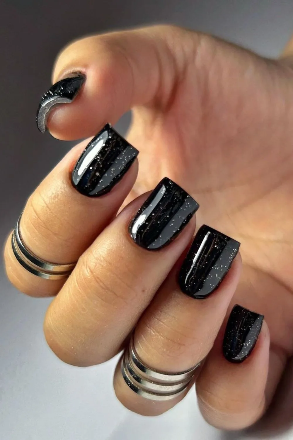 Speckled black nails