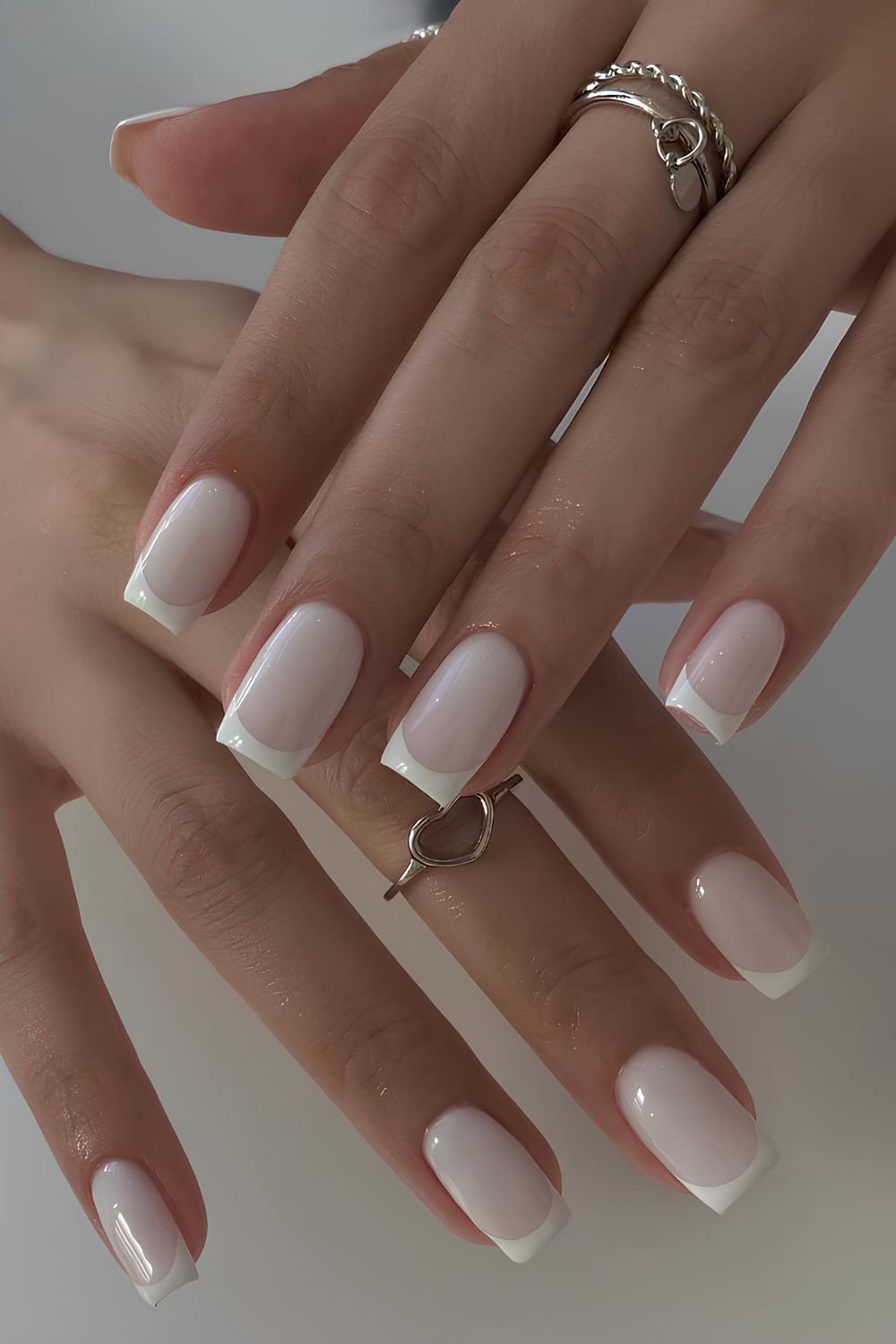 Square white French mani on milky base