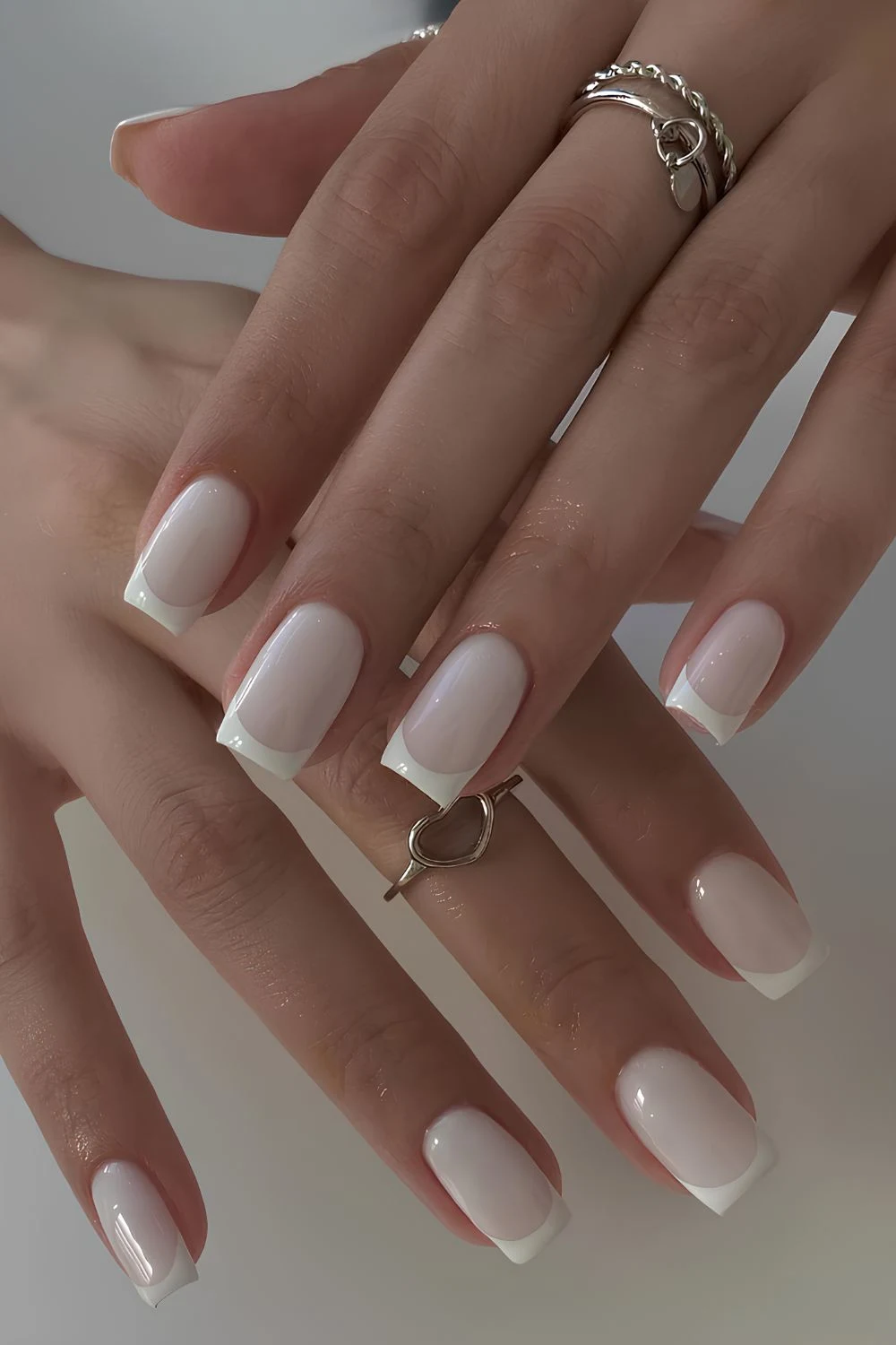 Square white French mani on milky base