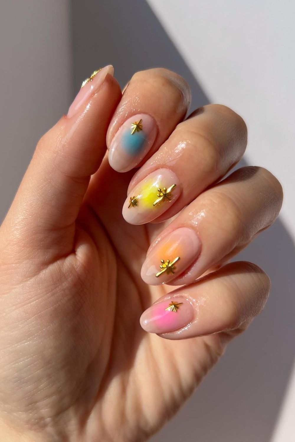 Starry pastel aura nails