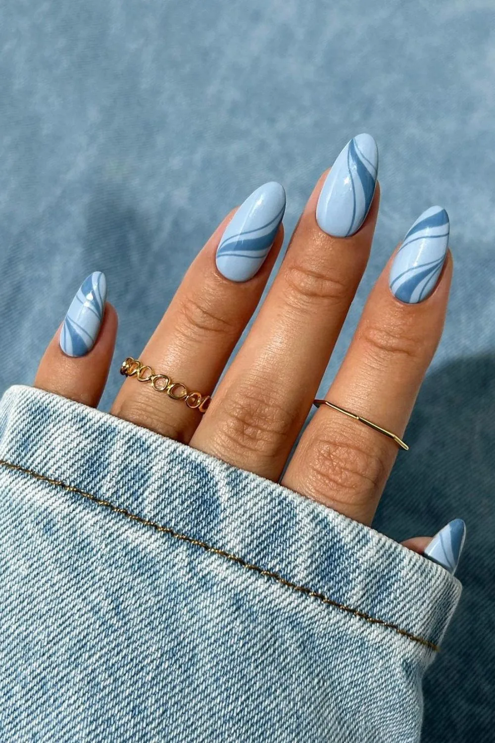 Swirly light blue nails