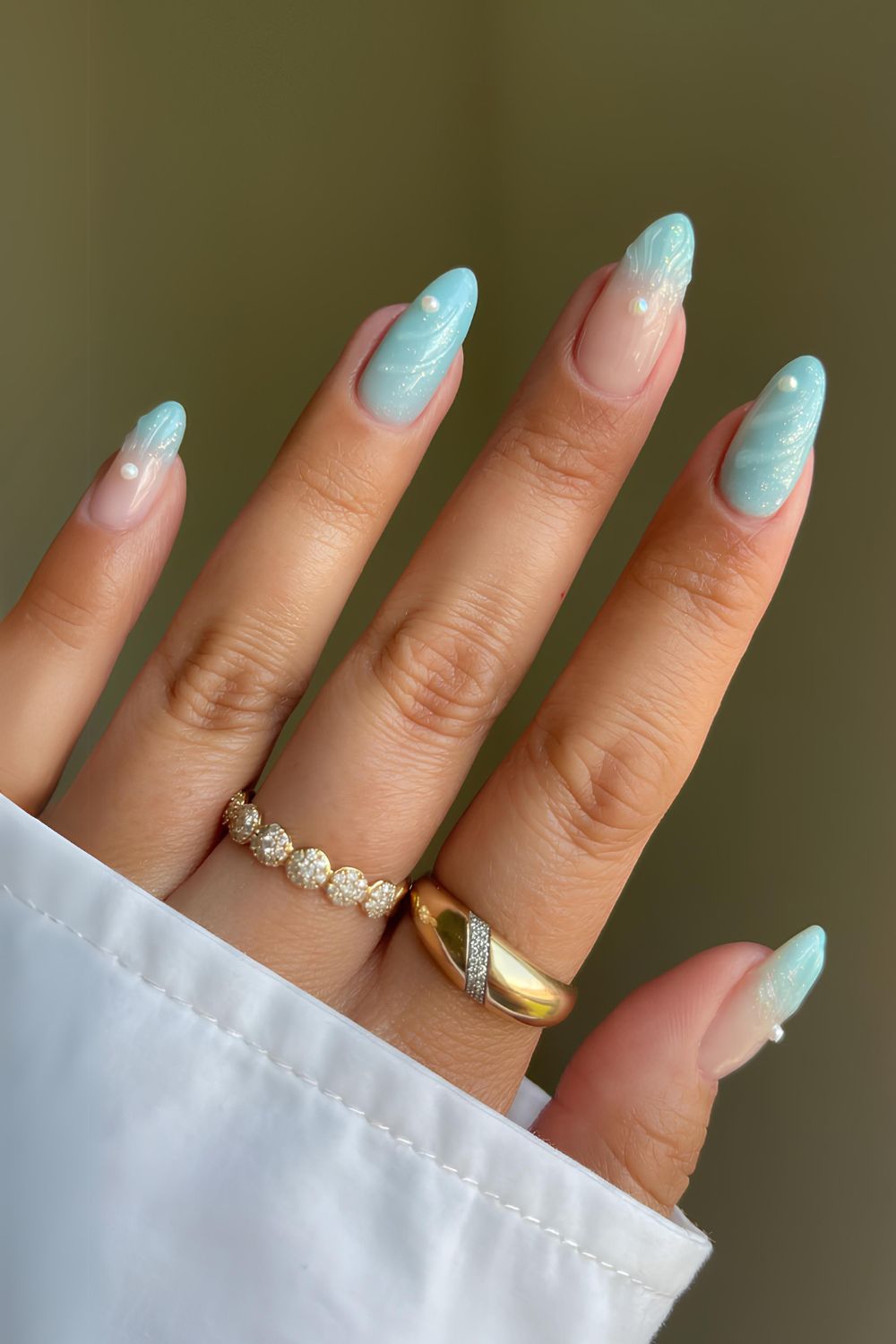 Turquoise blue mani with pearl accents