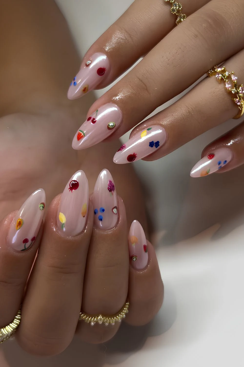 White chrome nails with fruity art