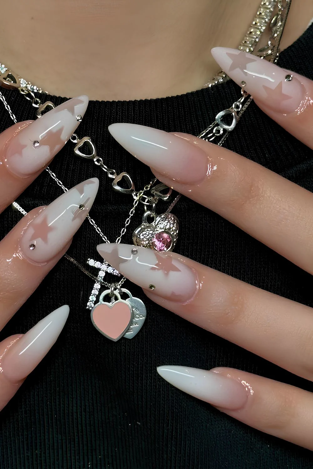 White ombre mani with stars and rhinestones