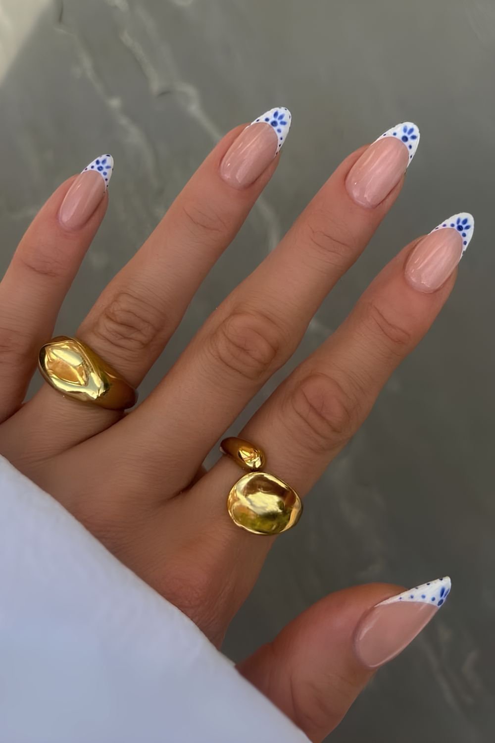 White summer French nails with ceramic style florals