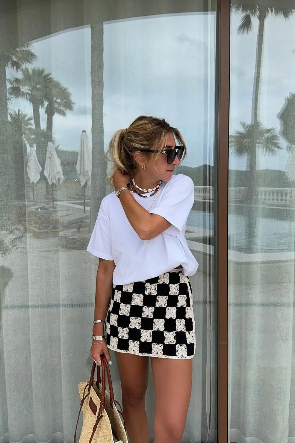 White tee and checkered skirt