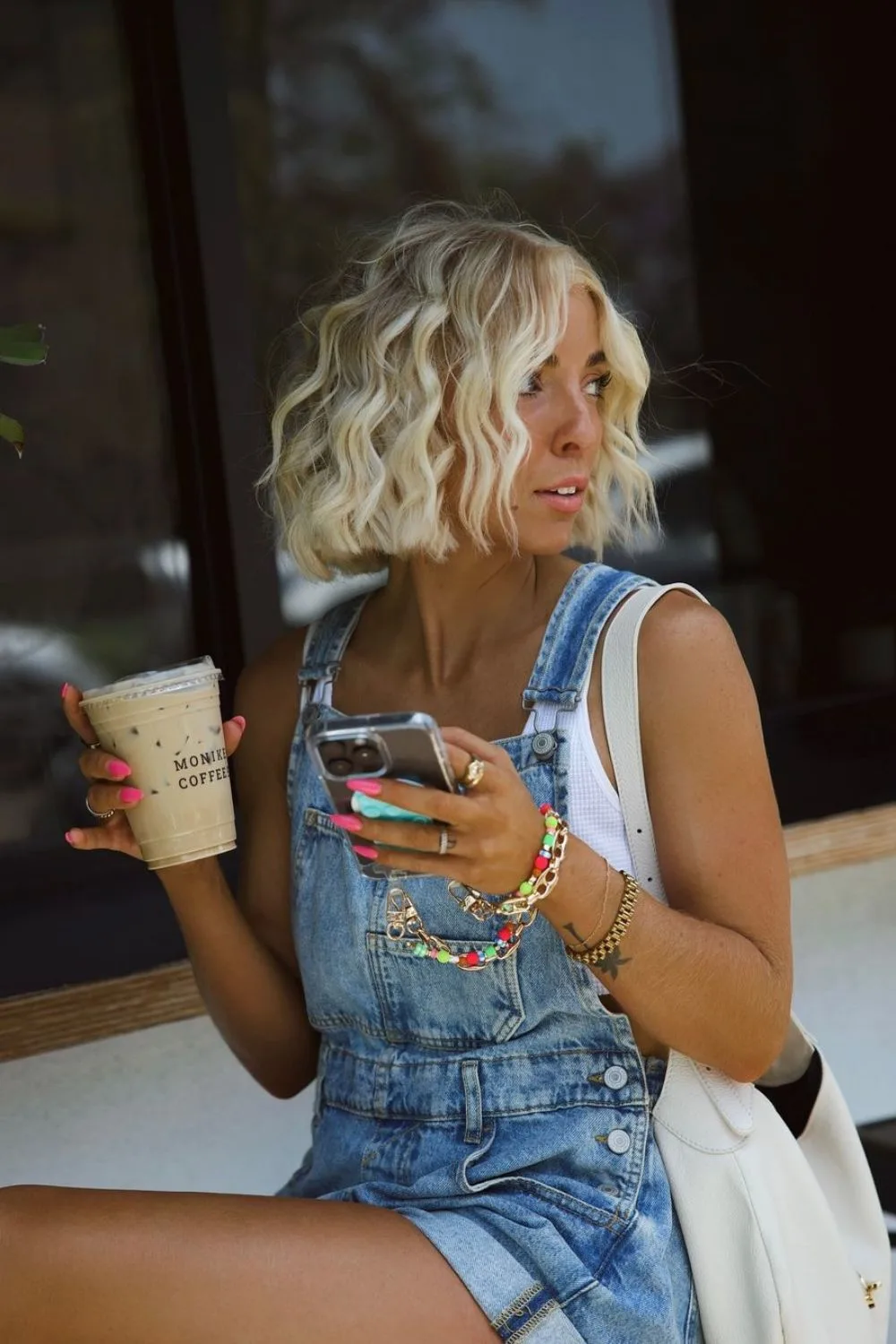 White top and denim overalls