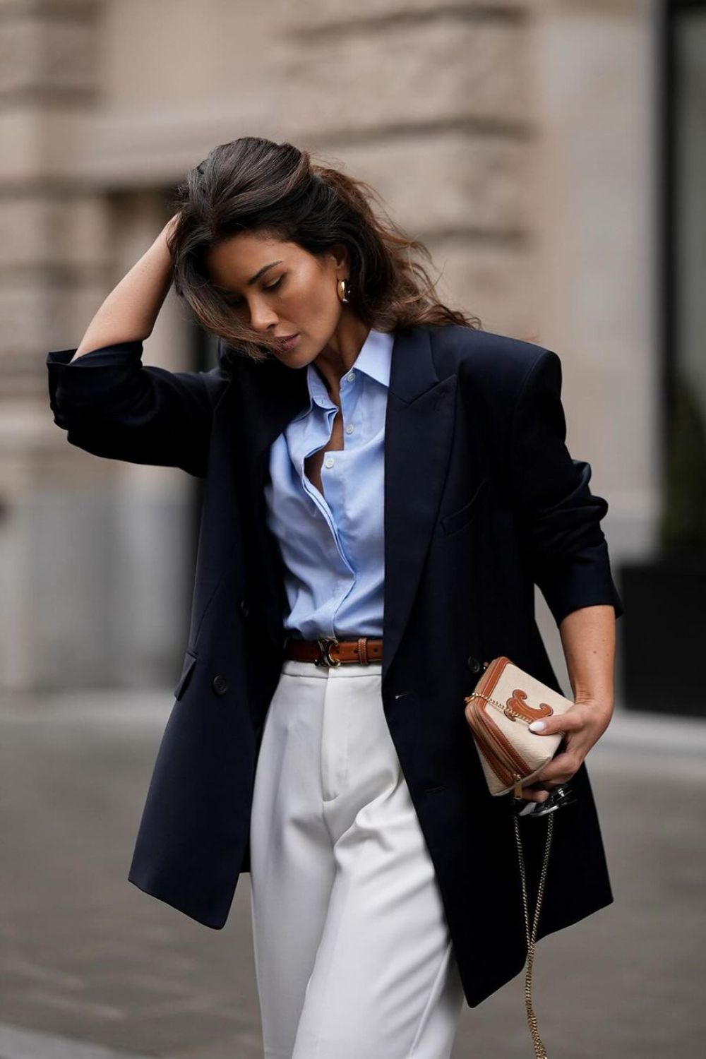 Woman in a tailored outfit