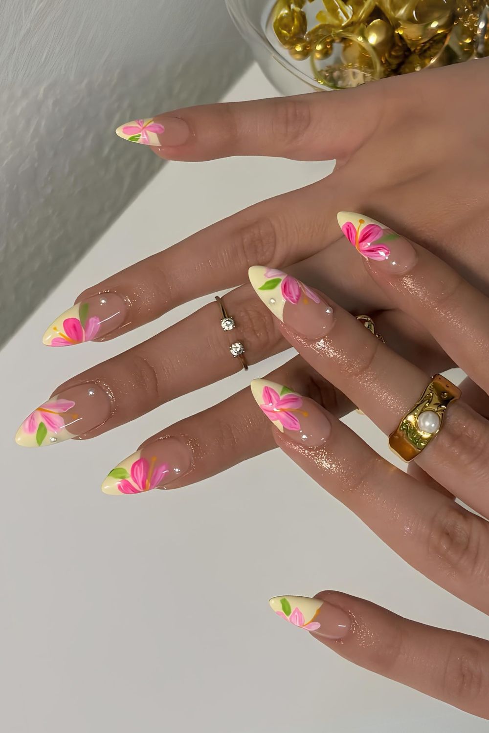 Yellow French nails with chunky pink florals