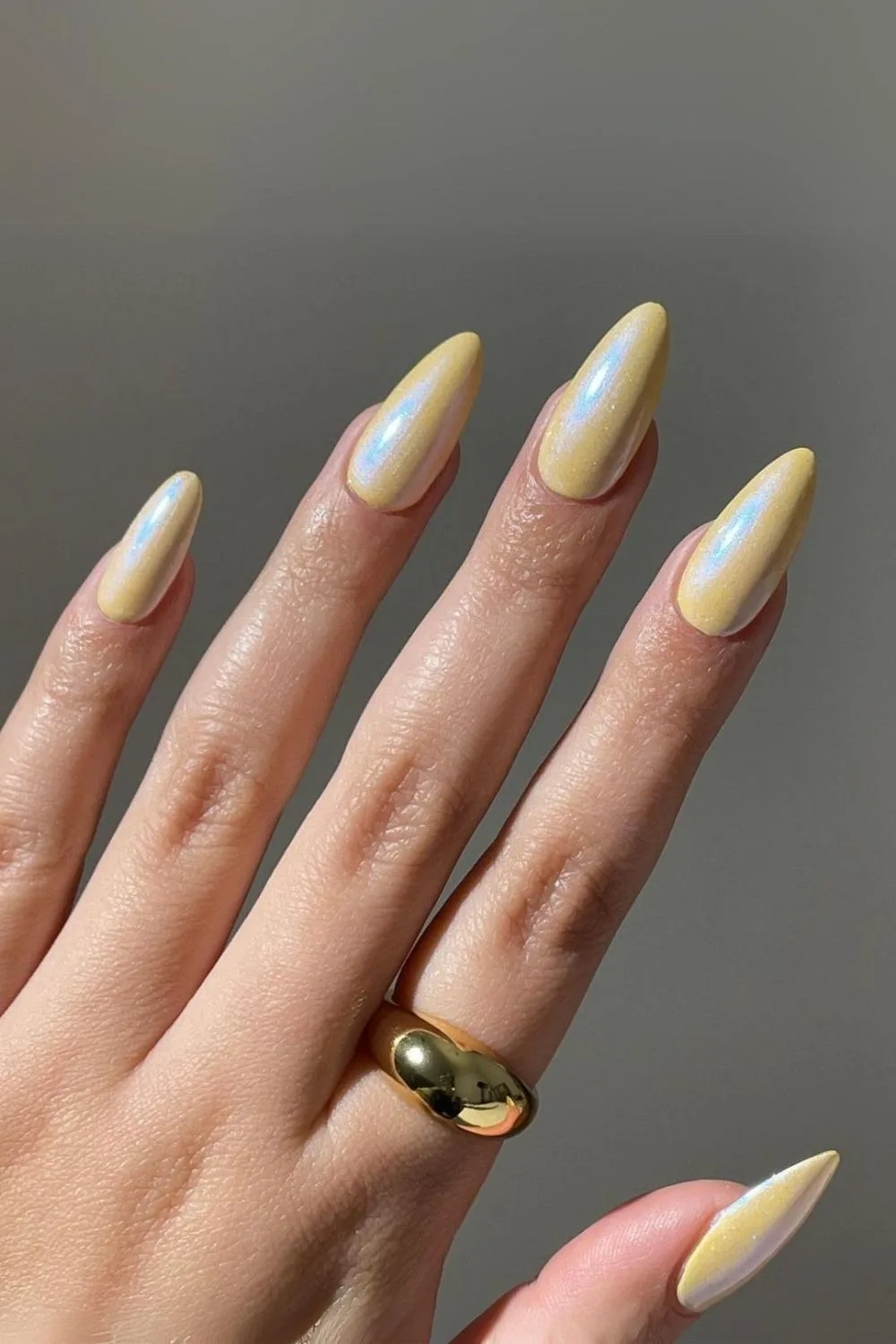 Yellow chrome nails