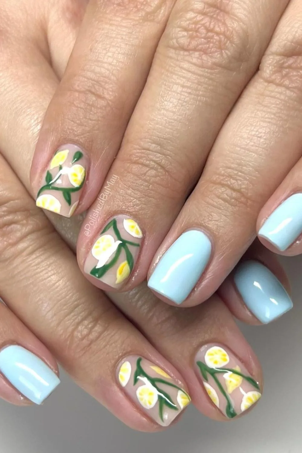 baby blue nails with lemons