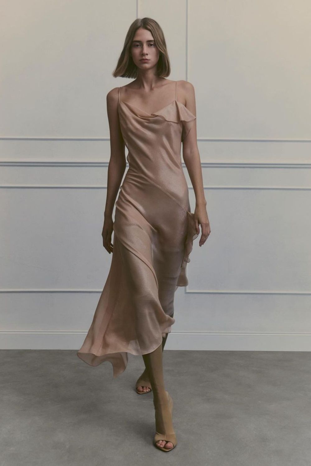 beige satin dress on a model