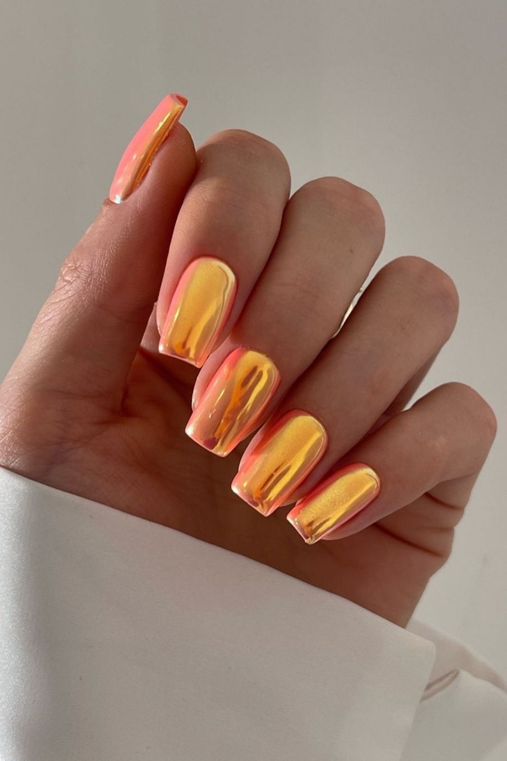 chrome orange nails