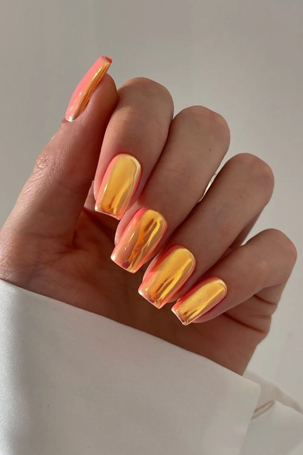 chrome orange nails