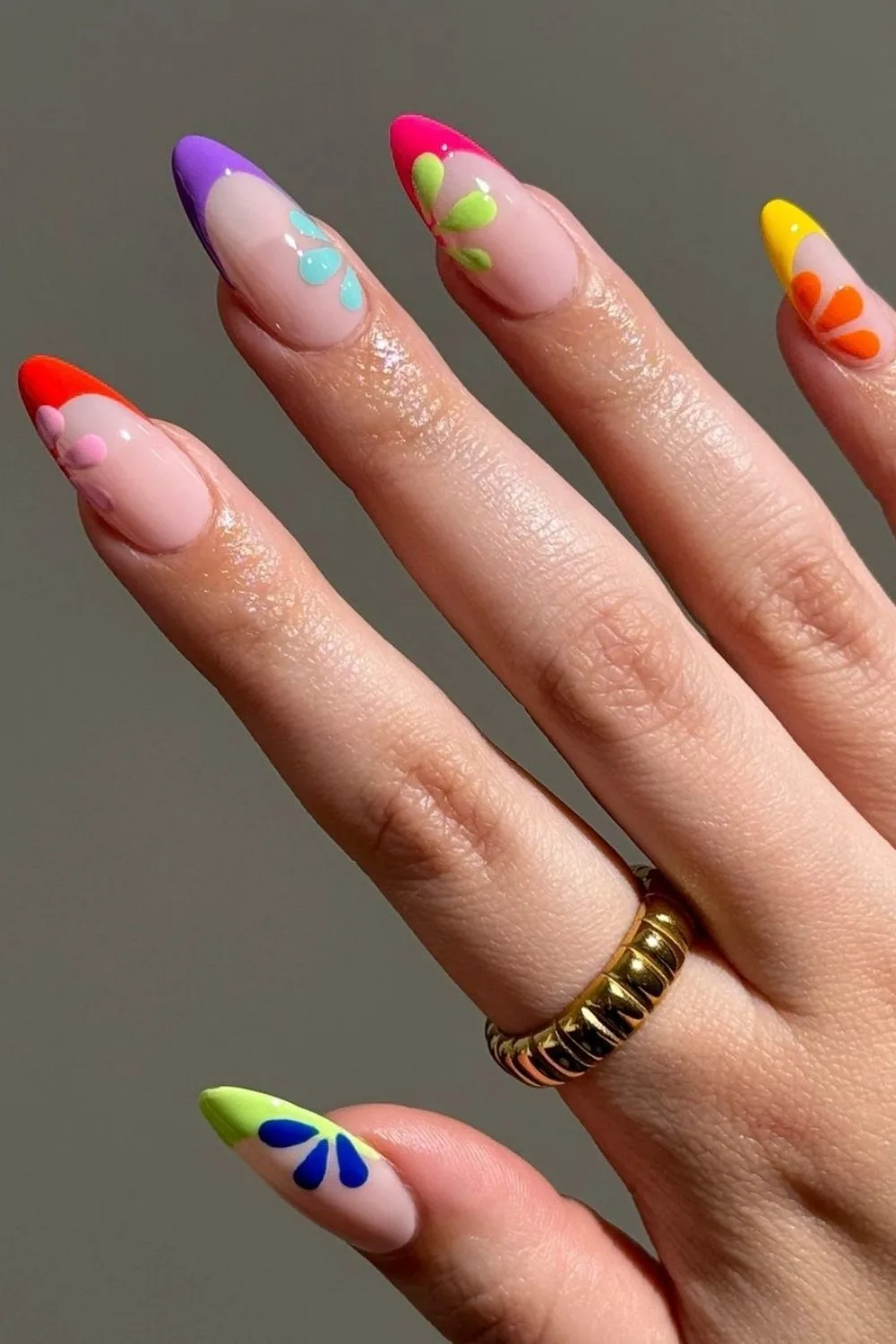 colorful french tips on almond nails