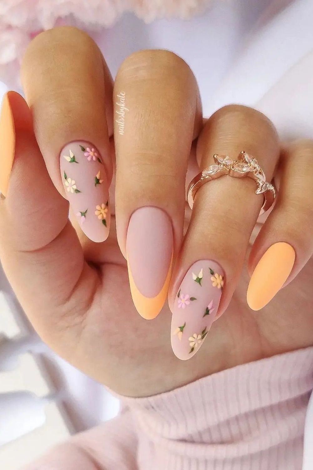 gentle orange nails with flower design