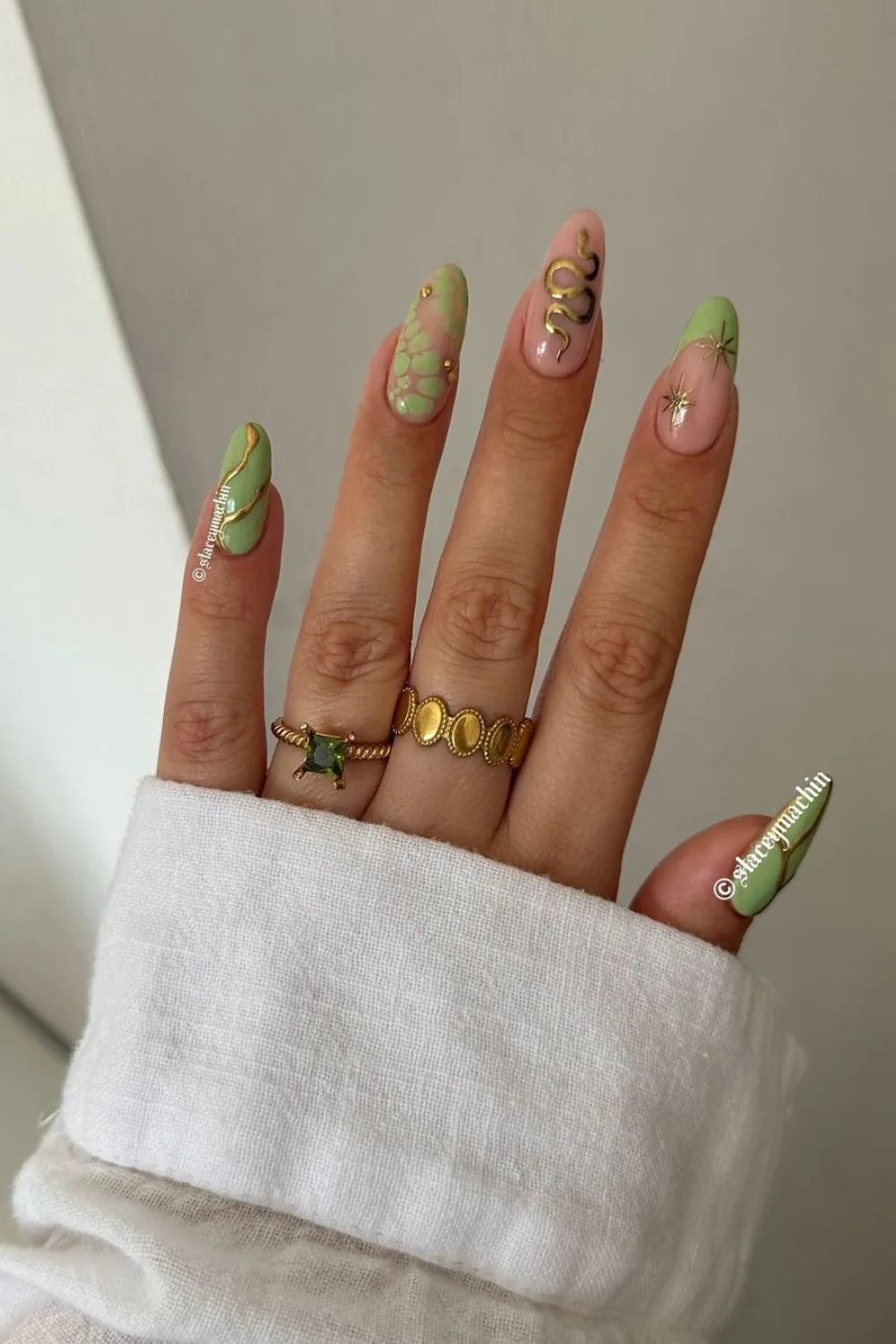 Jade green and gold nail design