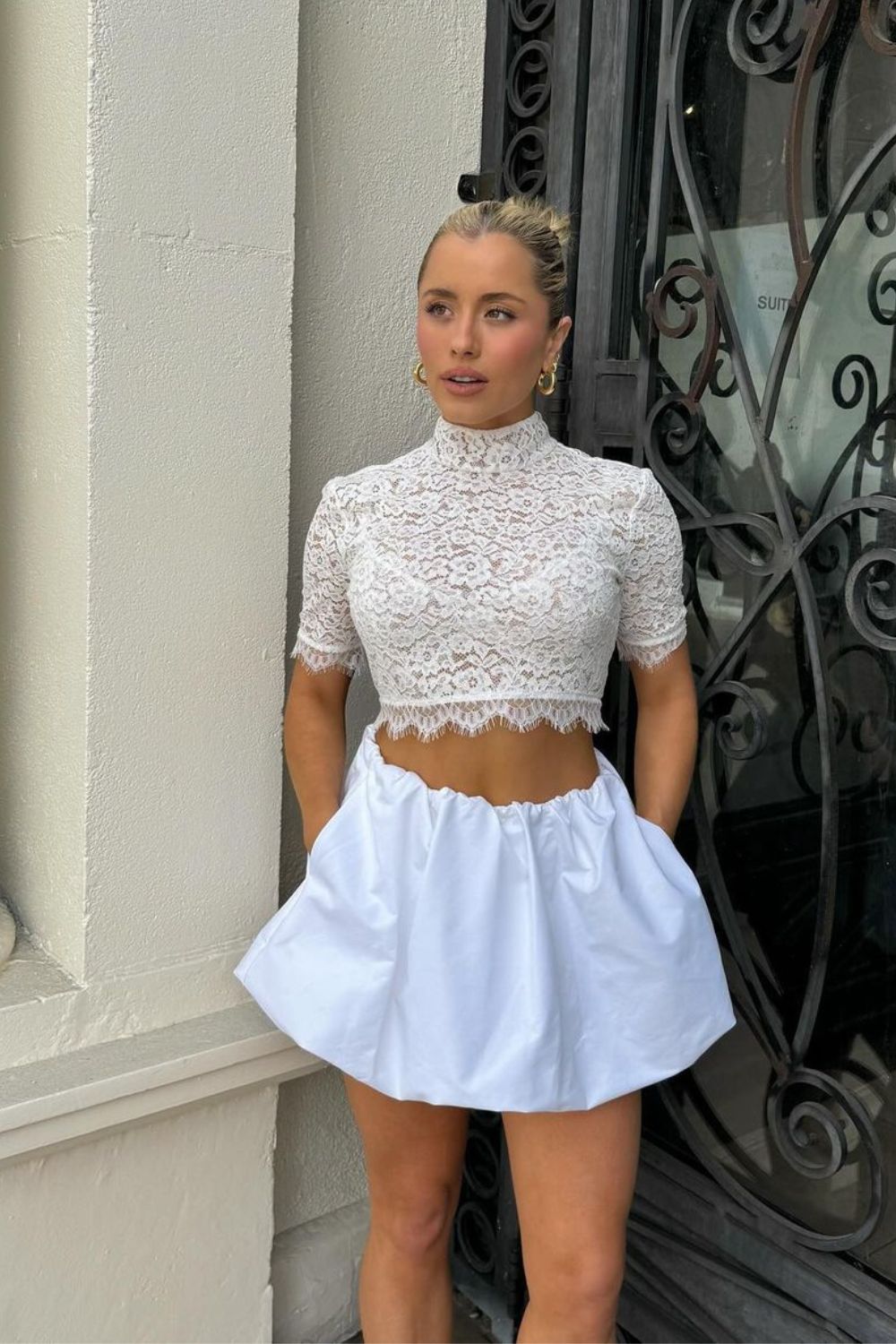 lace top and a white skirt