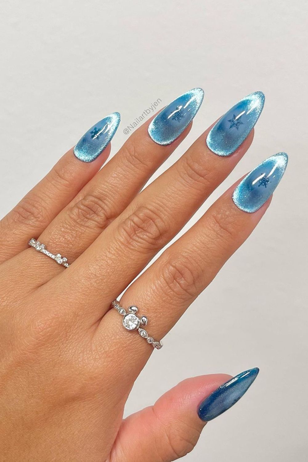 light blue velvet nails with snowflakes