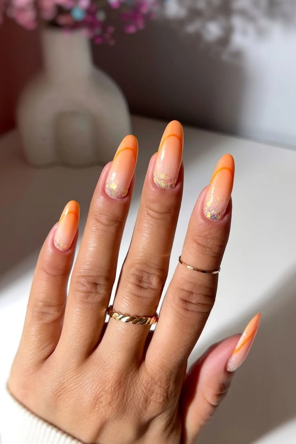 orange french tips with glitter