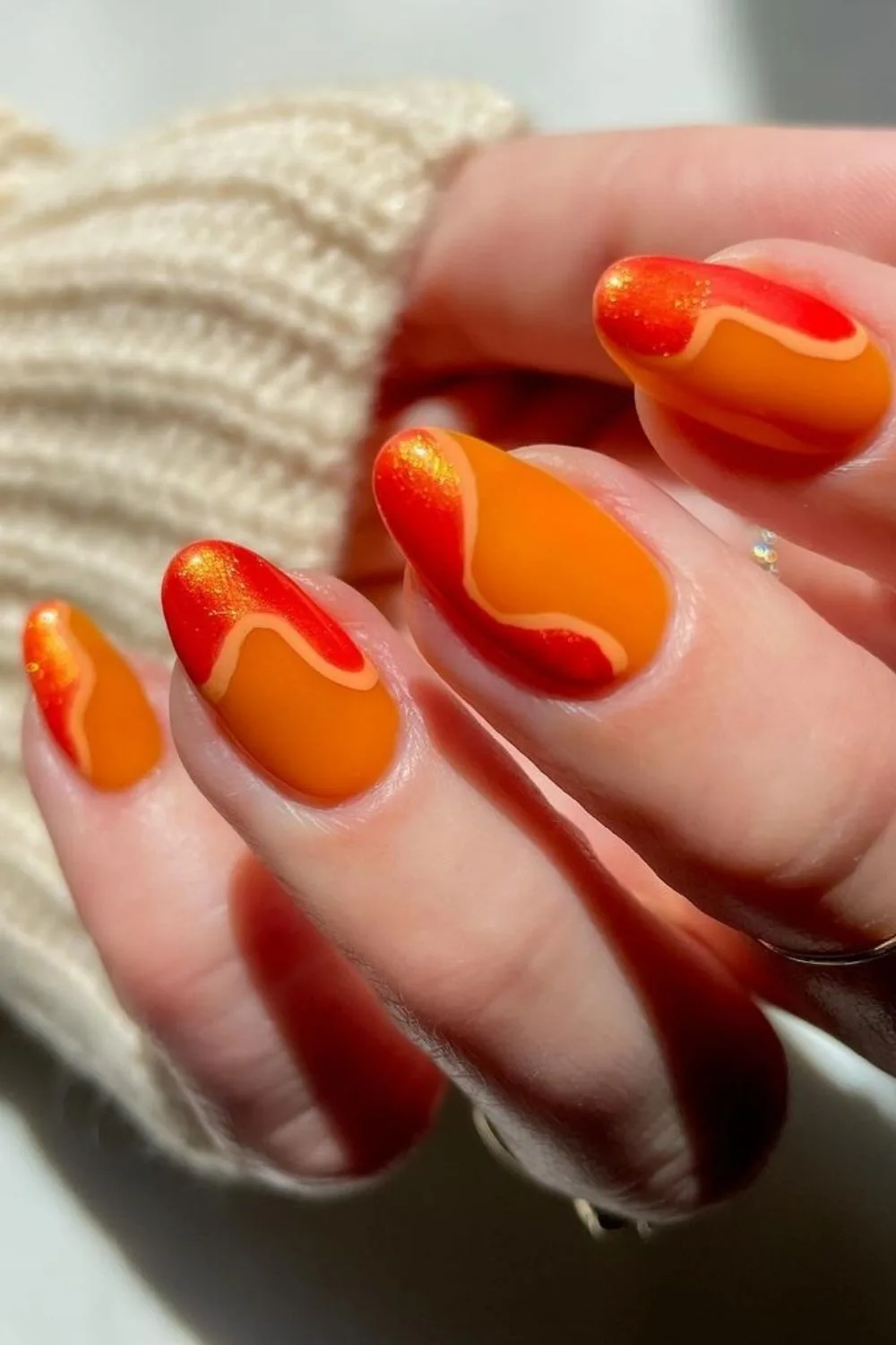 orange nails with design