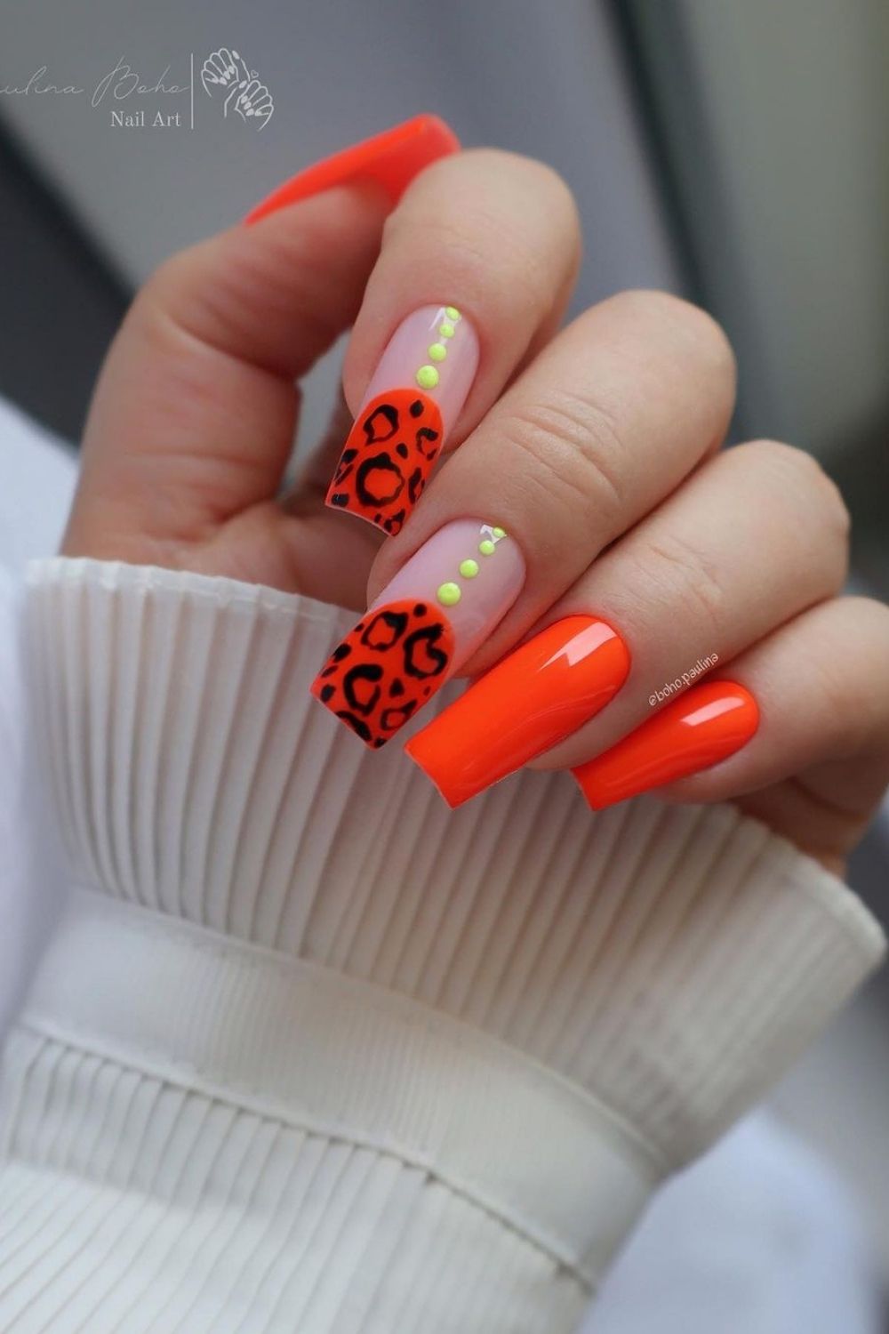 orange neon nails with leopard print