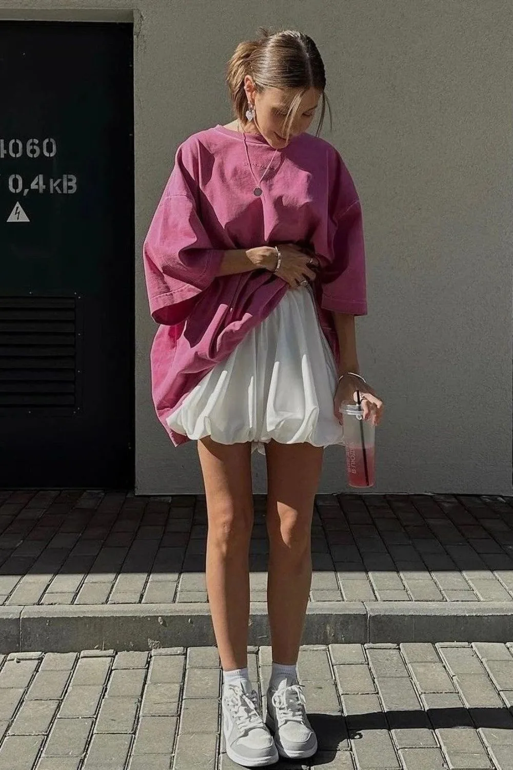 pink shirt with white skirt