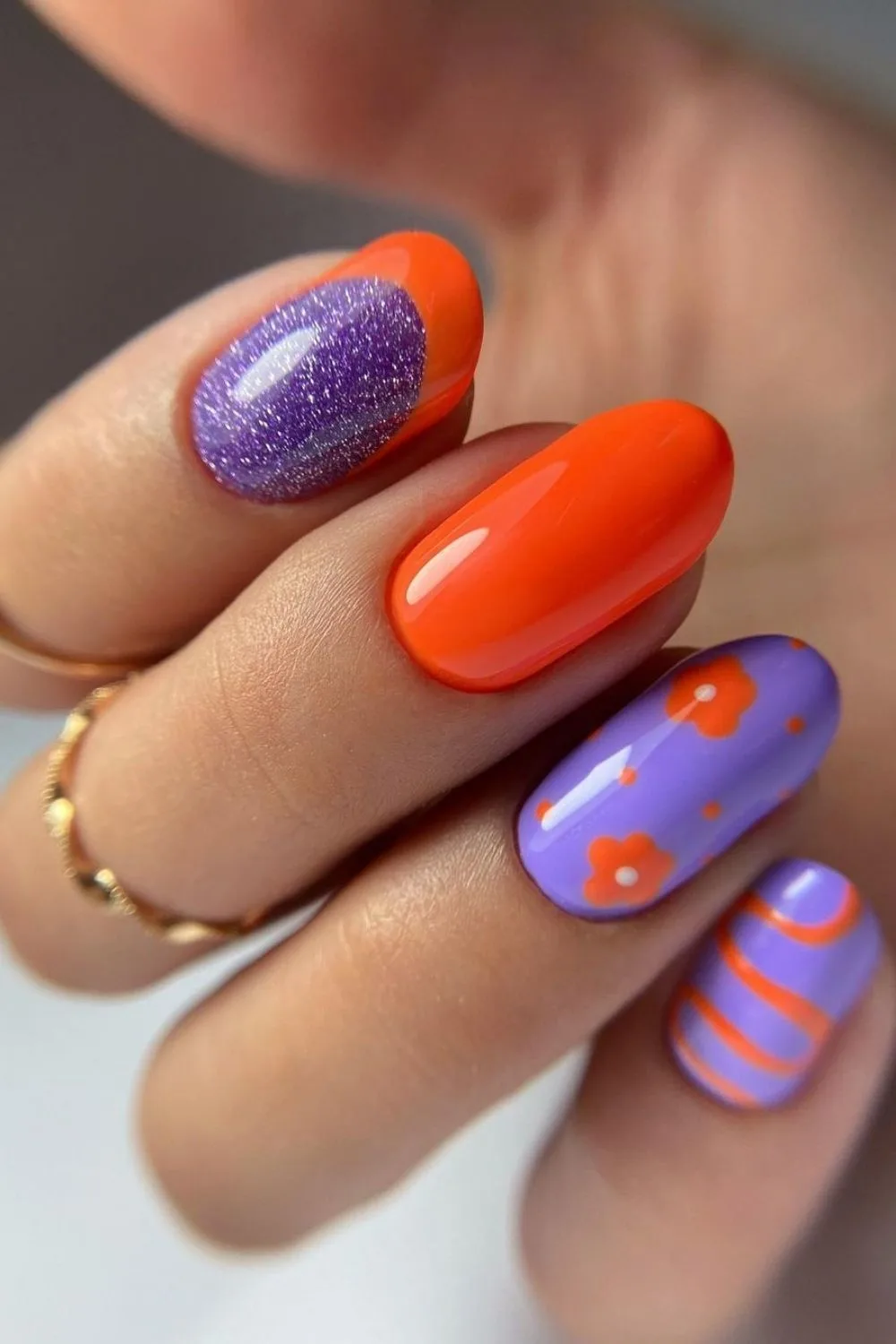 purple and orange short nails