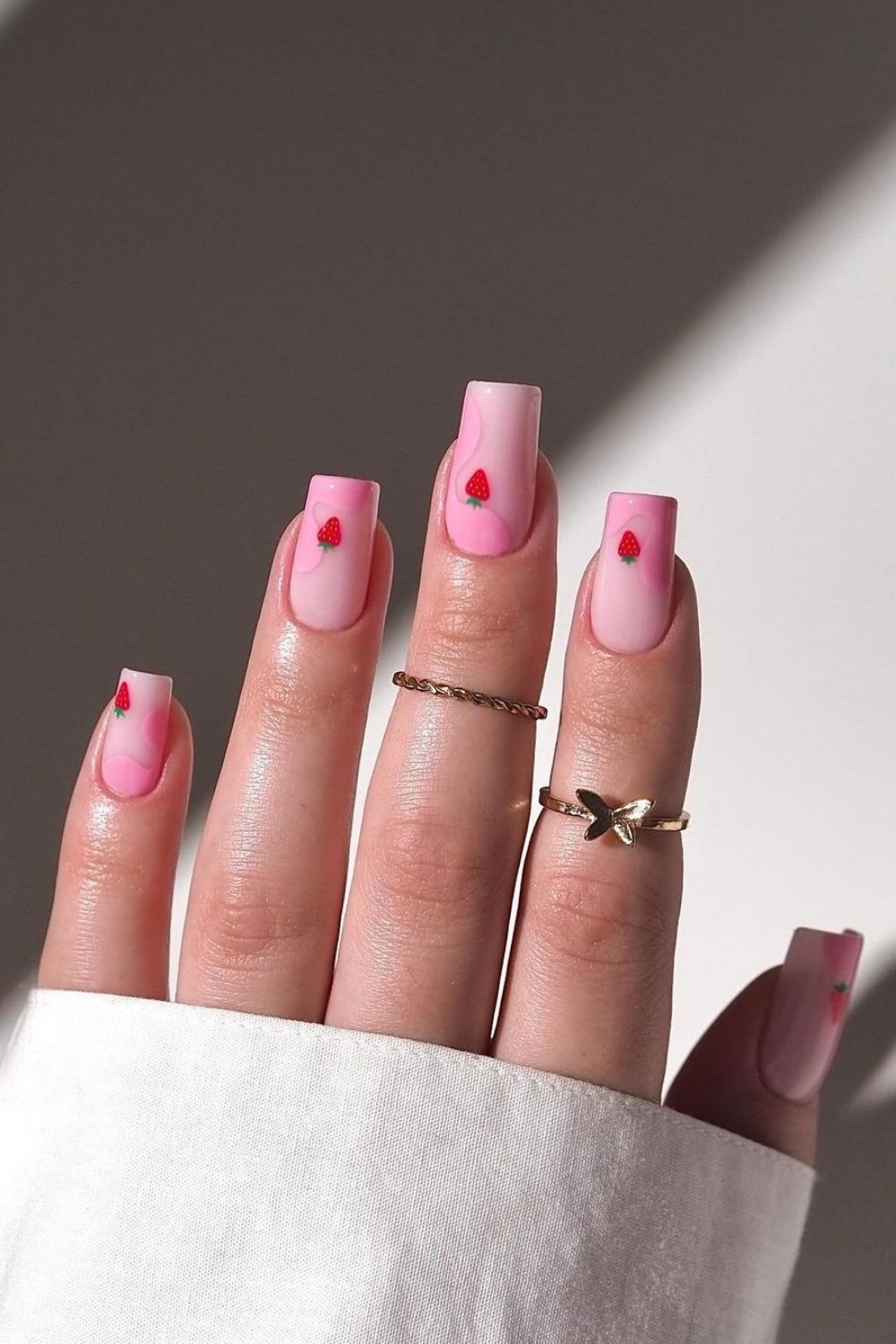 strawberry nails with swirls