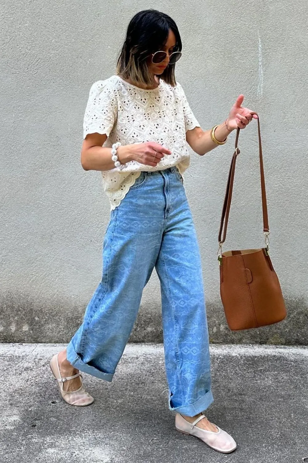 woman in a denim and white shirt