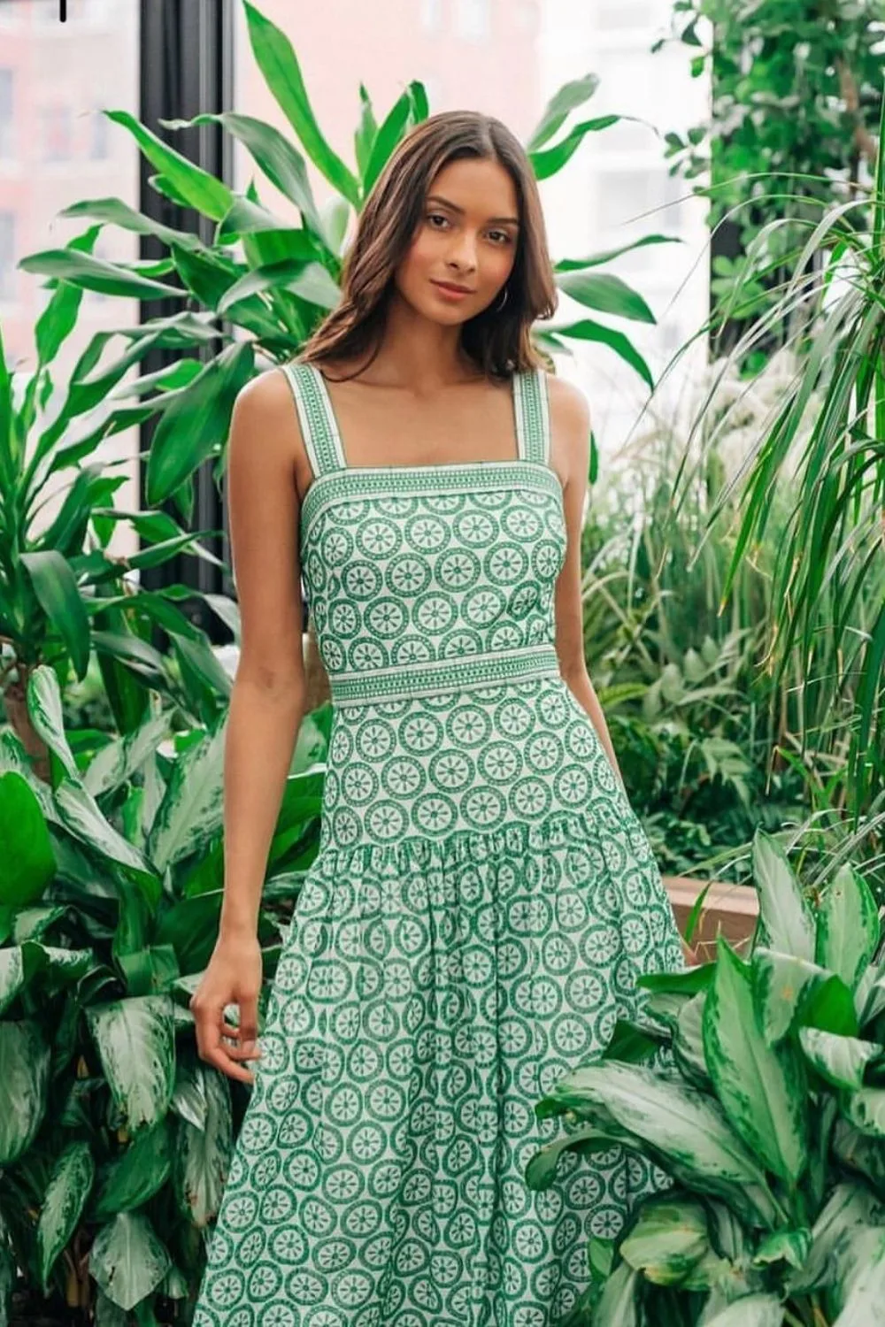 woman wearing green dress