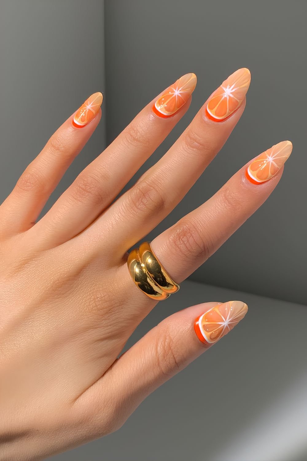 3d sculpted jelly orange slice nail design