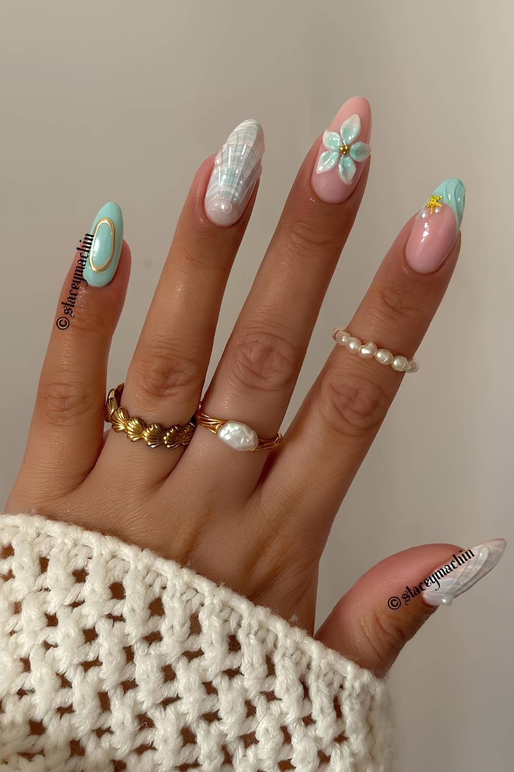 Aqua blue beach nails with floral and ocean art