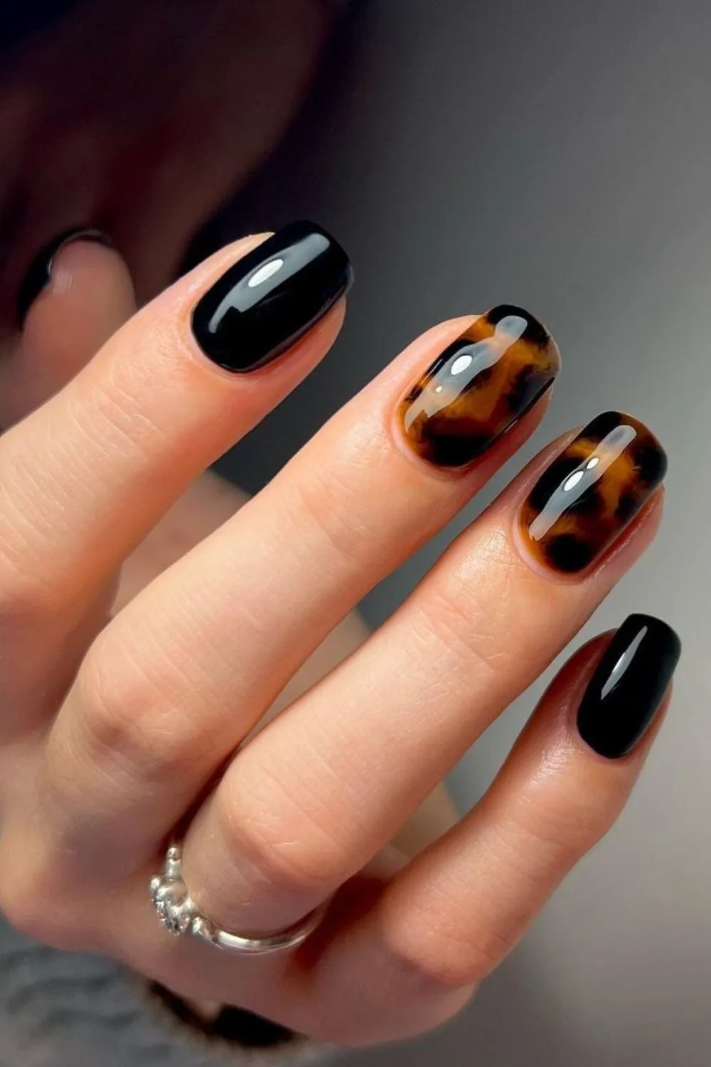 Black and tortie shell nails