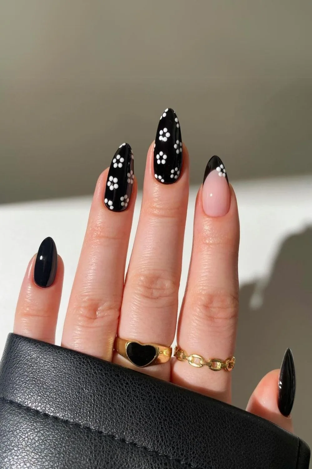 Black nails with white floral design