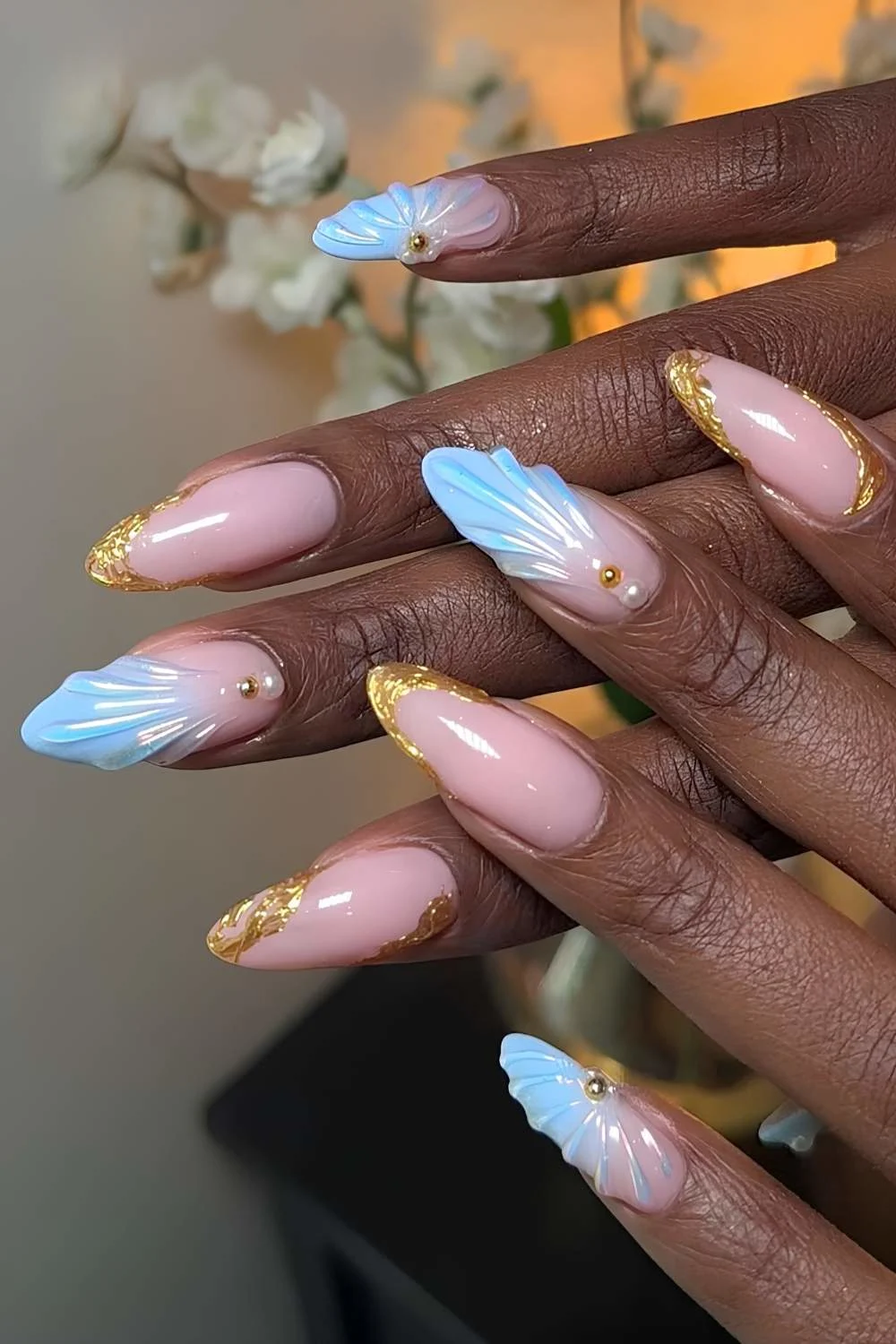 Blue and pink mermaid nails with gold details