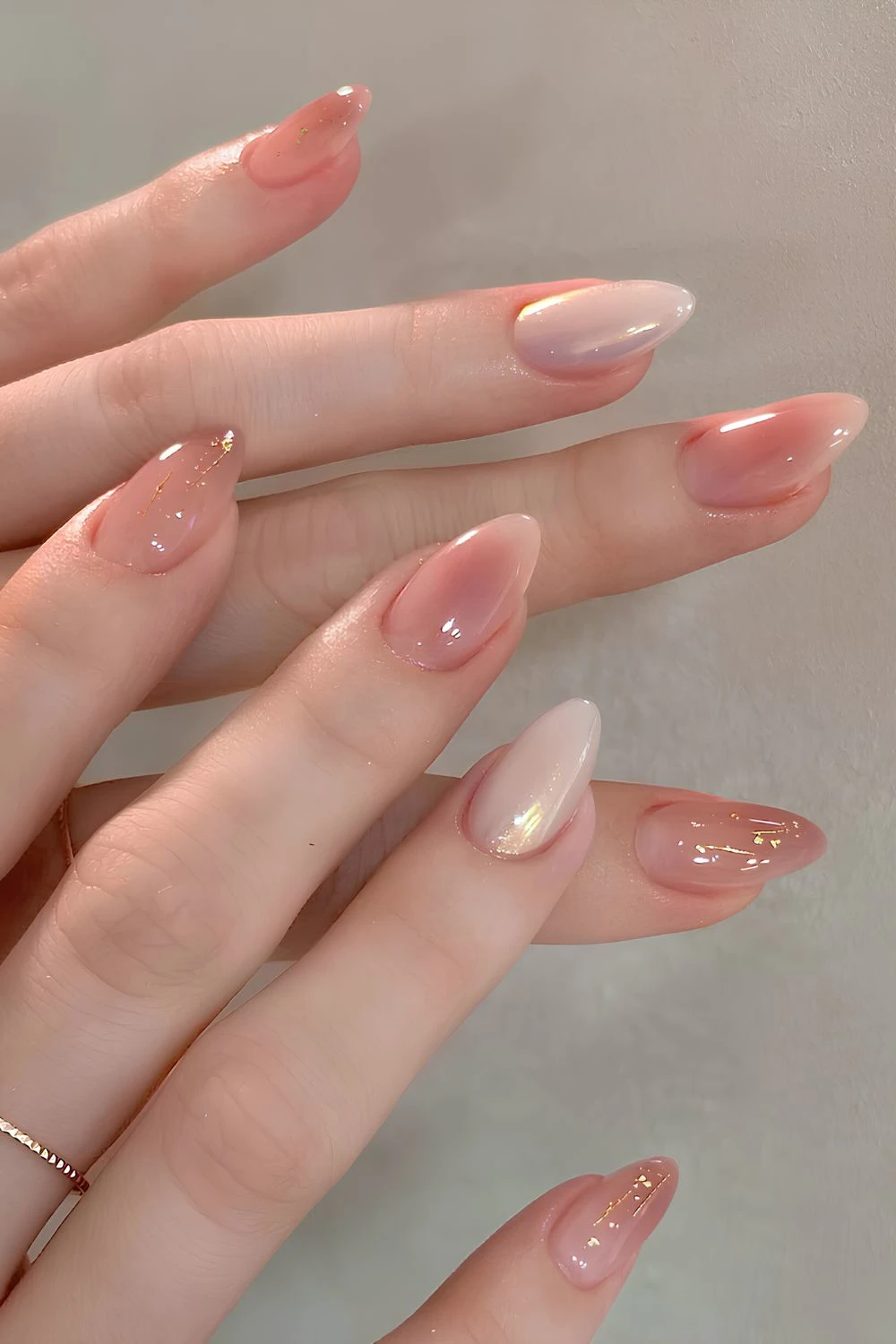 Blush effect nails with glitter and chrome accents