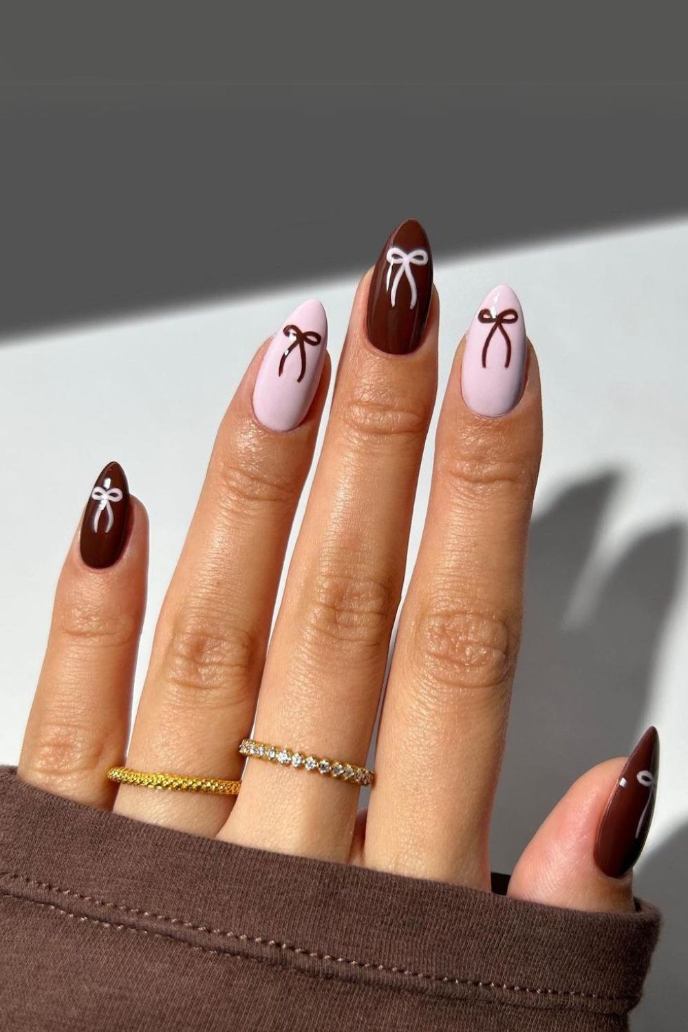 Brown coquette nails